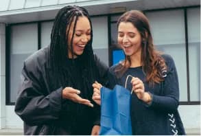 Two friends shopping together at an Ayr dispensary